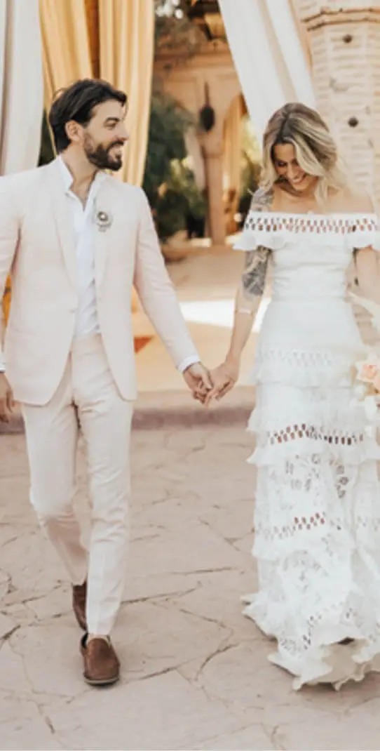 bride and groom wearing white