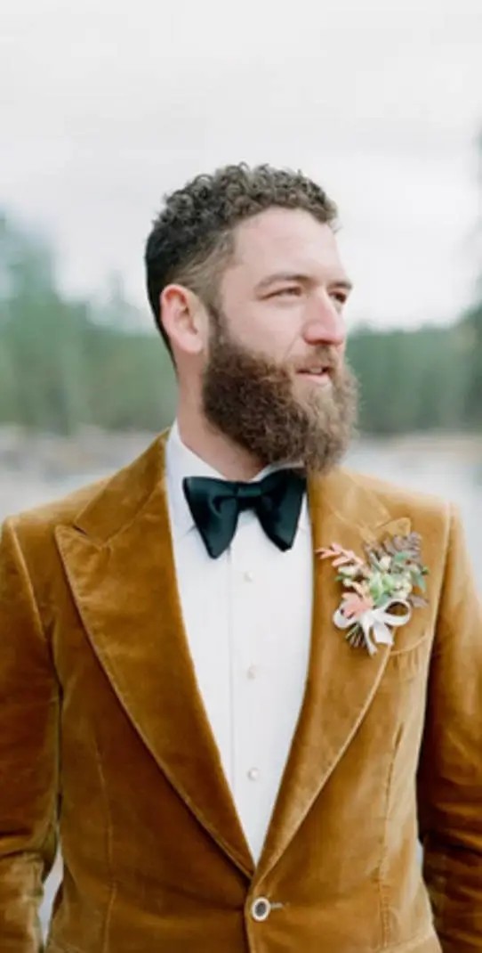 Man wearing a honey brown tuxedo
